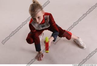 DENISA SITTING POSE WITH GUN